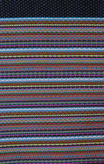 Colorful handmade cotton cloth. Vertical view.