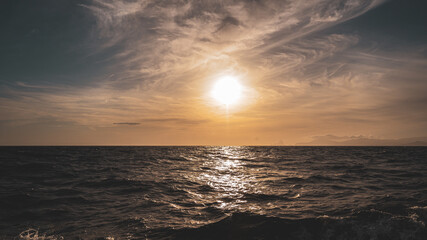 landscape - sunset on the coast, waves, horizon. top view.