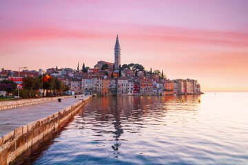 Obraz premium Cozy and quiet town of Rovinj with beautiful colorful houses on the Istrian peninsula, Adriatic sea at sunset