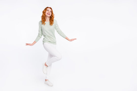 Full length body size photo young woman red hair looking copyspace dancing at party isolated white color background