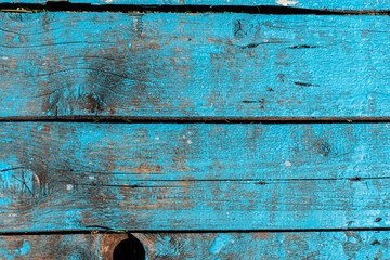 Wooden background made of old blue paint boards