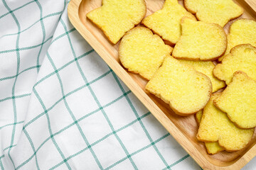 Dried butter toast with sugar placed on the cloth.top view