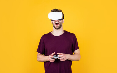 It is so real. playing virtual computer video game online. young man in vr glasses.
