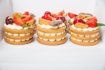 Set of different delicious cupcakes in a paper box