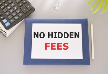Writing note showing No Hidden Fees. Business photo showcasing Tagged price is the one that you pay not additional payments. gray background, Pencil, Notebook and calculator.