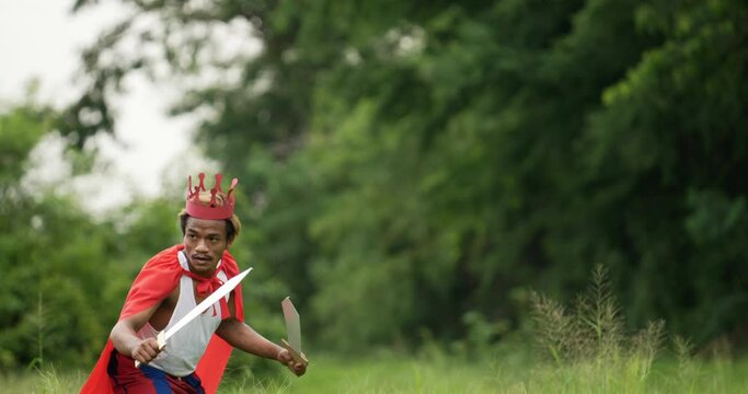 Hero man in red with crown holding sword