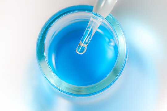 blue liquid pipette and bottle see lab images