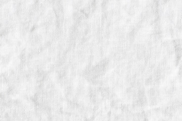White linen tablecloth texture top view.