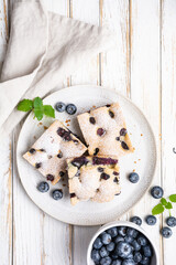 Delicious blueberry cake sprinkled with powdered sugar