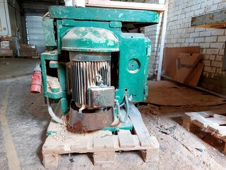 a very old Soviet-era electric motor for a woodworking workbench