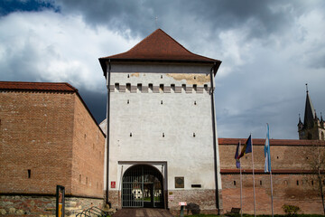 The tower and the entrance to the medieval fortress of the city Targu Mures, Transylvania.