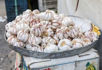 Large quantities of garlic for sale in the market in Amman. 
