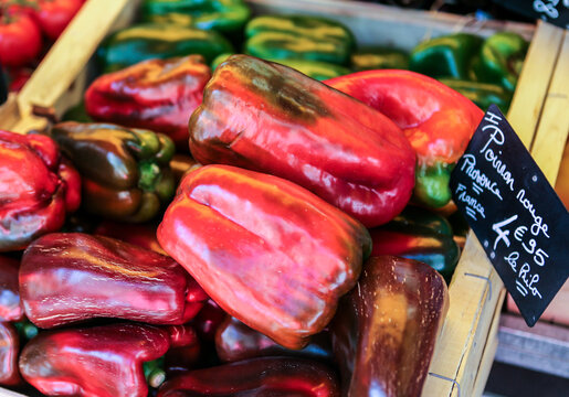 Red and green peppers for sale at the market. 