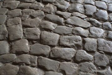 Stone Pavement. Granite Cobble Stoned Pavement Background