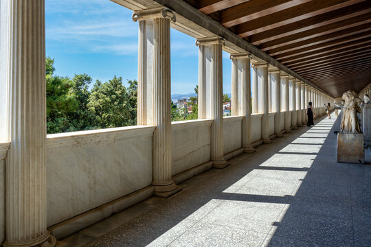 Athens, Attica, Greece. Stoa of Attalus (Attalos) interior view of the upper floor at the archaeological site of Ancient Agora of Athens. Greek, Roman antiquities. Sunny day, people