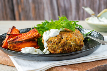 Lamb burger with spicy sweet potato wedges