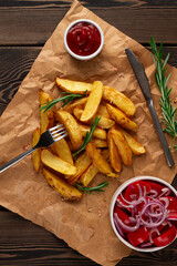 Baked, fried potatoes with rosemary and spices, close-up, horizontal, no people,