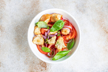 tomato vegetable salad panzanella veggie croutons, olive oil, rusk healthy food meal snack copy space food background  vegan vegetarian food