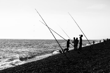 Black and White silhouette of fishing on the sea