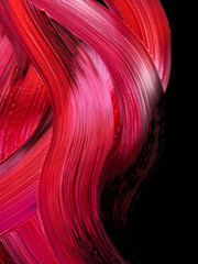 Smudged red and pink lipsticks over black background