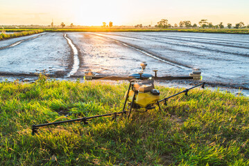 Herbicide spraying drone Going to Takeoff in the Rice Field