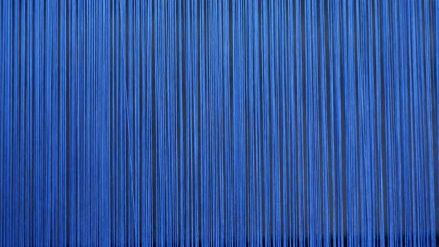 Multiple blue threads while getting woven