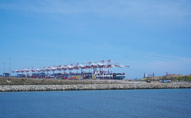 Fototapeta na wymiar Cranes for maritime transport in the port area
