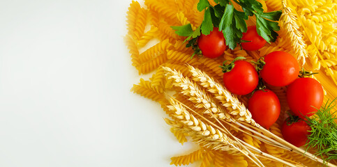 dry pasta, tomato, herbs, ear of bread