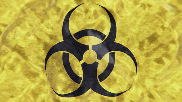 Realistic looping slow motion 3D animation of the grungy textured waving yellow flag with Biohazard symbol rendered in UHD