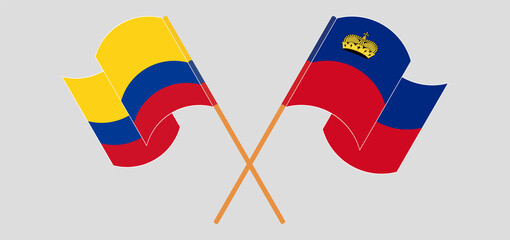 Crossed and waving flags of Colombia and Liechtenstein