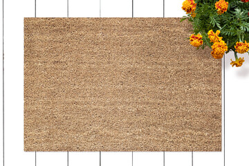 Mockup of Coir Doormat on wooden floor with flowers