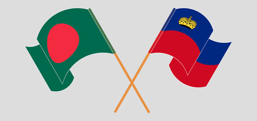 Crossed and waving flags of Bangladesh and Liechtenstein