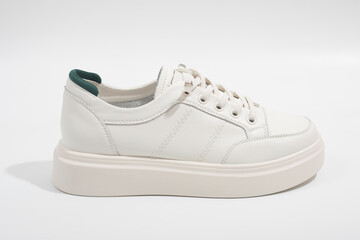 Women's white leather sneakers with thick soles