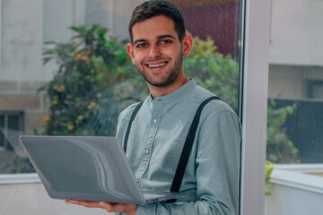 businessman with laptop in office