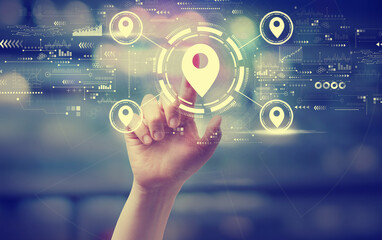 Map pin concept with a hand pressing a button