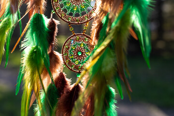 Handmade dream catcher with feathers threads and beads rope hanging