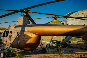 Fototapeta na wymiar Decommissioned helicopter in an aircraft graveyard