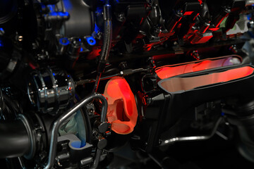 the internal combustion engine of a car in a section to demonstrate the internal parts. A mock-up...