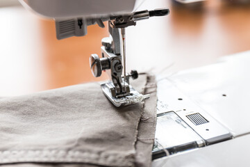 Production line sewing machine. Needle and footstep detail