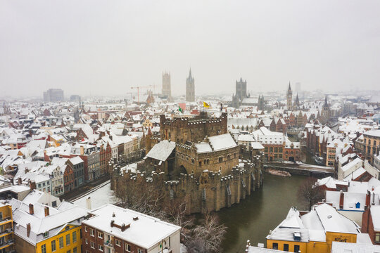 Aerial view of the medieval Castle of the Counts, Gravensteen in wintertime with snow in Ghent, Belgium.