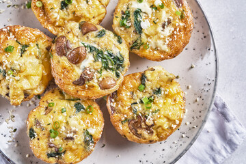 Vegetarian egg muffins with mushroom, spinach and cheese for Breakfast