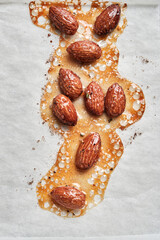 background made with caramelized almonds with honey and sugar