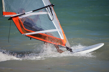 closeup view of a windsurfer surfing off of Virginia Key beach,Florida.