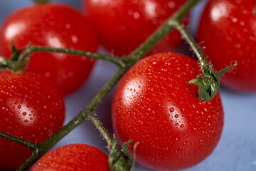 Cherry tomatoes on a wooden board