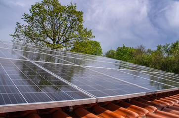 Sunlit wet photovoltaic system after rain