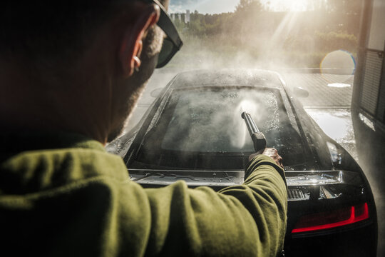 Exotic Car Owner Pressure Washing His Sporty Car