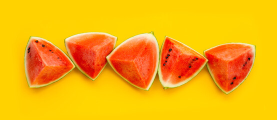Watermelon on yellow background. Top view