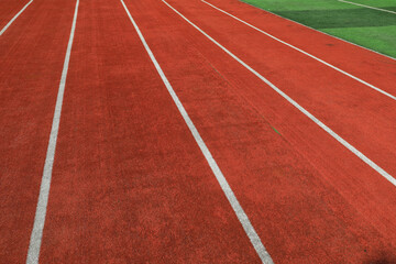 The red plastic track is on the playground