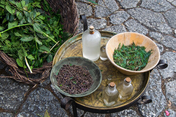 Old traditional utensils and plants to make essences or perfume.