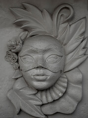 typical masked character from the venice carnival embossed.
high relief